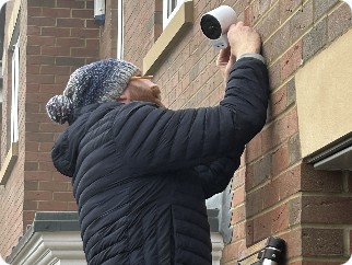 External security camera installation on brickwork