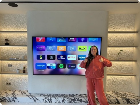 Bespoke media wall with smart TV and marble hearth