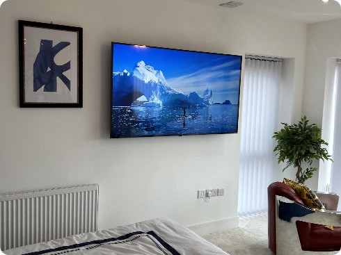 Large flush wall mount in bedroom with concealed cables